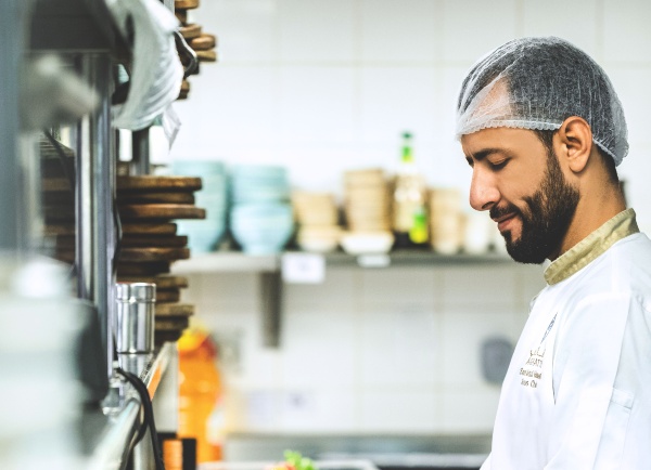 Male chef with a hair net